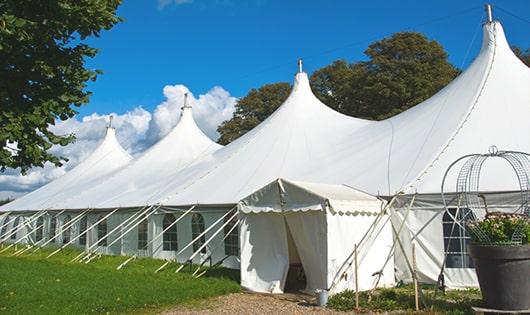 high-quality portable toilets stationed at a wedding, meeting the needs of guests throughout the outdoor reception in Attleboro, MA